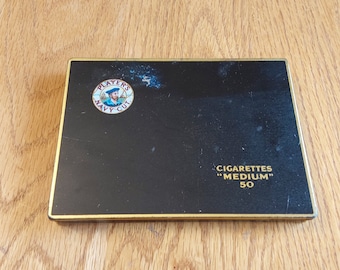 Players Navy Cut metal hinged 4.25" by 6" cigarette tin for Cigarette "Medium" 50 from the 1960s John Player and Sons in England.  Misc 1442