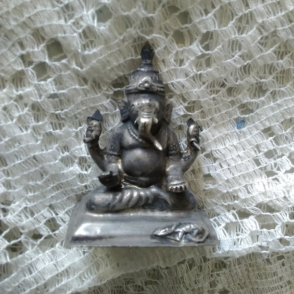 Antique silver Lord of Ganesha 4 armed statue that one of the most worshiped deities in Hindu culture, with an elephant head.  Misc 1146