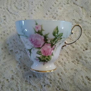 Made by EB Foley, a bone china tea cup in Pink Romantic Rose. CS 61