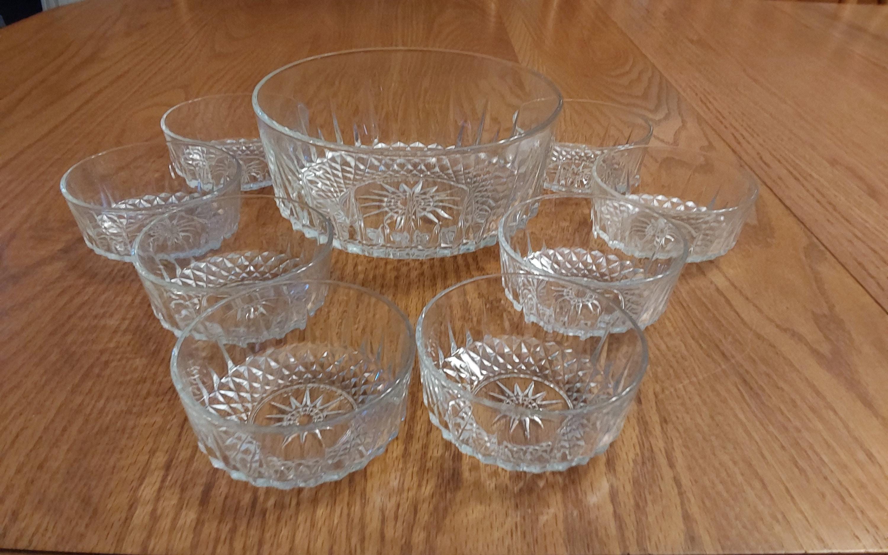 A 9 Piece Fruit or Salad Bowl Set by Arcoroc in Their Starburst