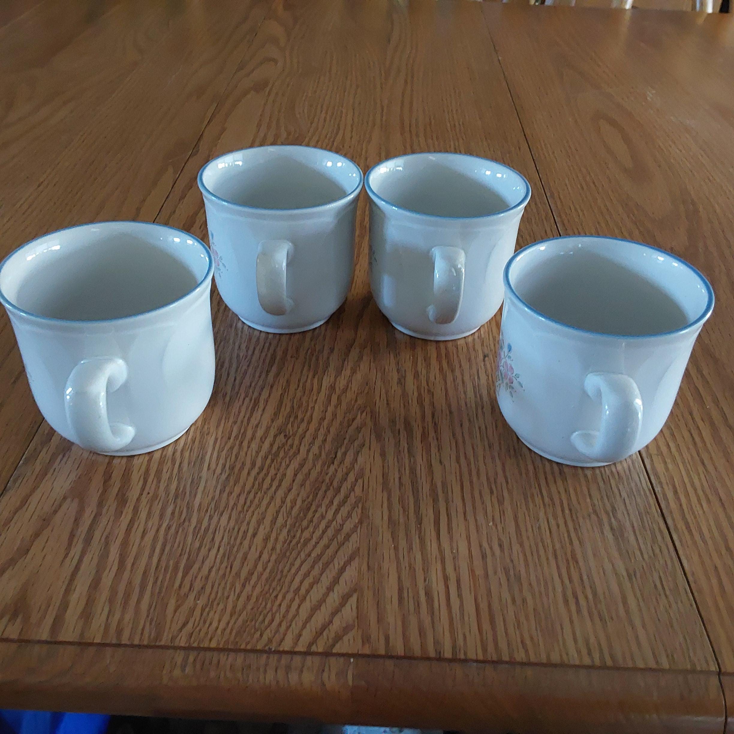 A Matching Set of 4 Johann Haviland 12 Oz Cream Colored Ceramic