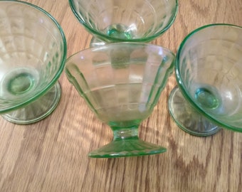 Set of 4 matching green uranium depression glass pedestal dessert dish by Anchor Hocking Glass in the Optic Block pattern.  Dish 454
