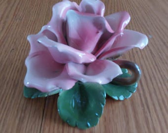 Capodimonte Italy porcelain large pink porcelain rose candle holder that has a hint of white, with green leaves and stem handle.  Candle 568
