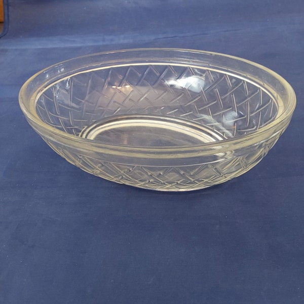 A clear glass textured oval woven "basket" for a "hen on a basket" candy dish from the 1960s.  Misc 1379