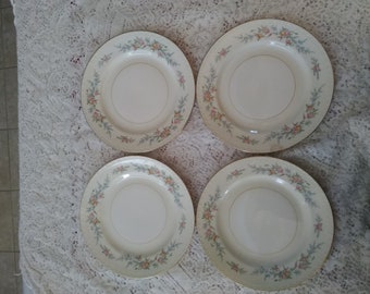 Homer Laughlin Eggshell Georgian Nautilus Ferndale pattern, 4-10" dinner plates with pink yellow and blue flowers with gold trim.  HL 45