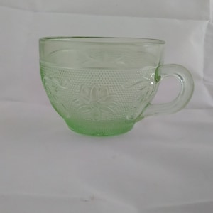 A rare colored Chantilly Green 8 oz coffee cup from Indiana Glass in their Tiara Sandwich Glass pattern.  Tiara 158