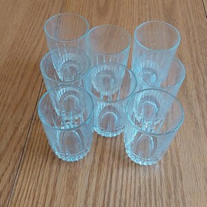 Set of 8-5.5 oz matching crystal Arcoroc, from France, juice glasses in the Cavalier pattern by J G Durand.  Glass 926