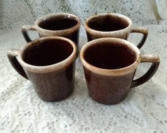 By Mccoy Pottery, a Set of 4 Matching Brown Drip Glaze 9 Fluid