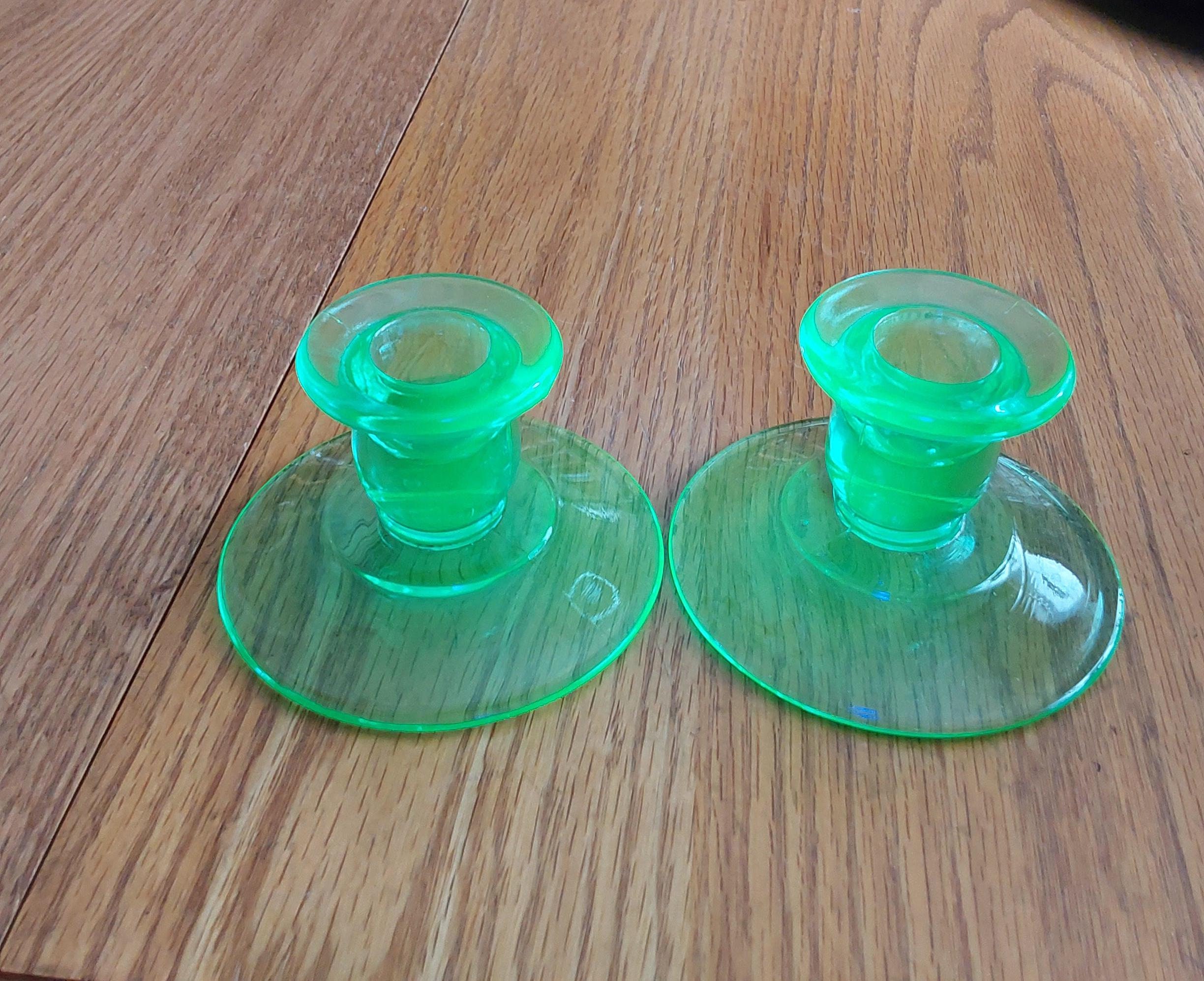 A Set of 2 Matching Green Uranium Depression Glass Candle Stick