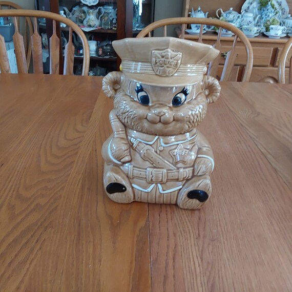 A Twin Winston Stoneware Pottery Tan Teddy Bear Police Chief