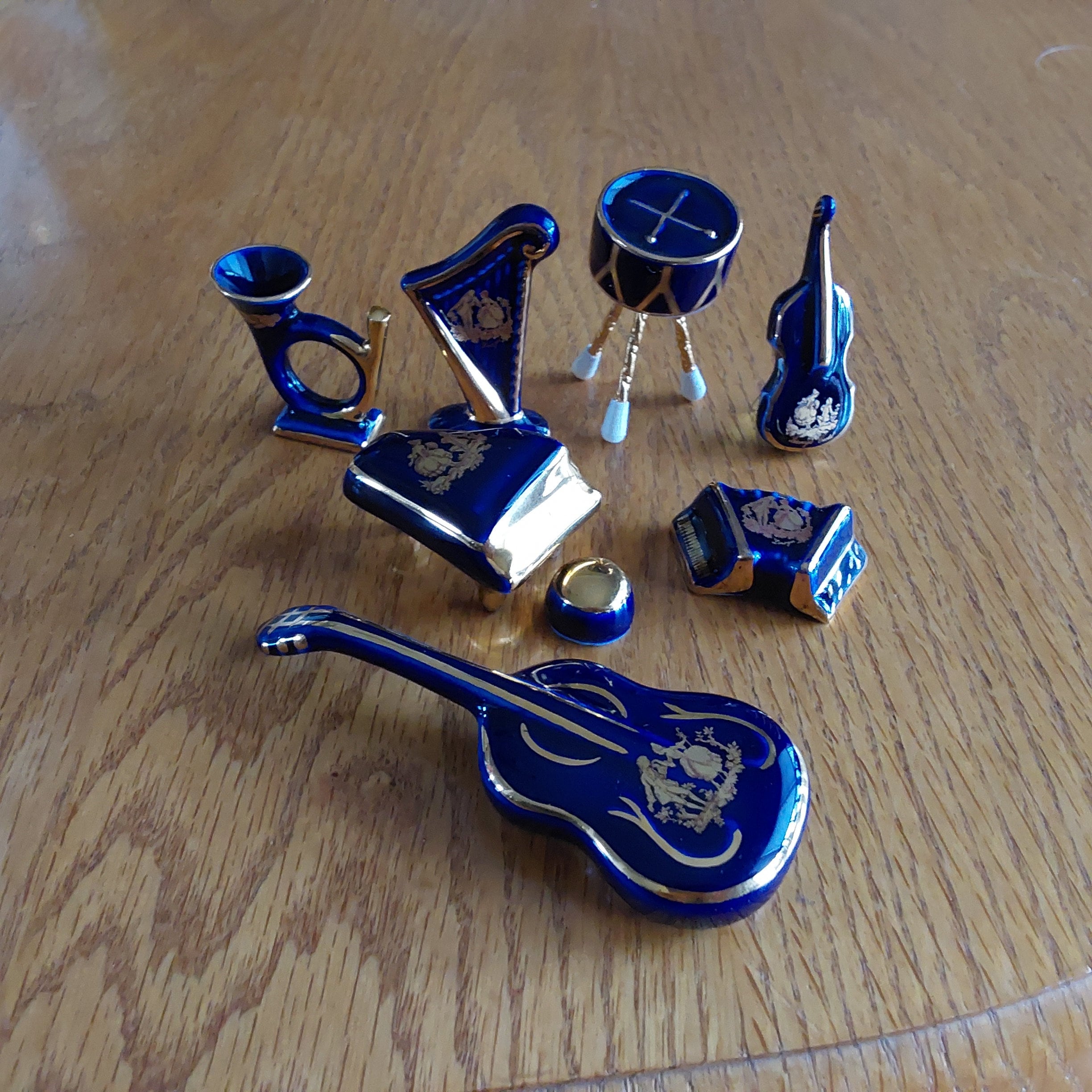 Lot of 7 Limoges France Porcelain Cobalt Blue and Gold Trim is a