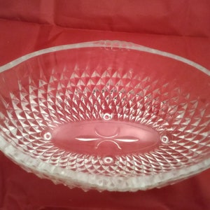 An Indiana Glass footed oval bowl in the diamond point design.  Bowl 516