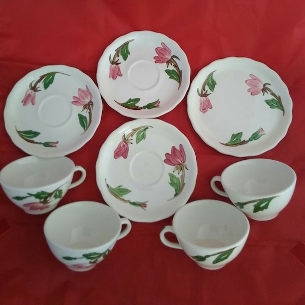 A set of 8 matching pieces of Continental Kilns dishes with a Green Arbor Design...4 cups, 3 saucers, 1 small plate.  Dish 820