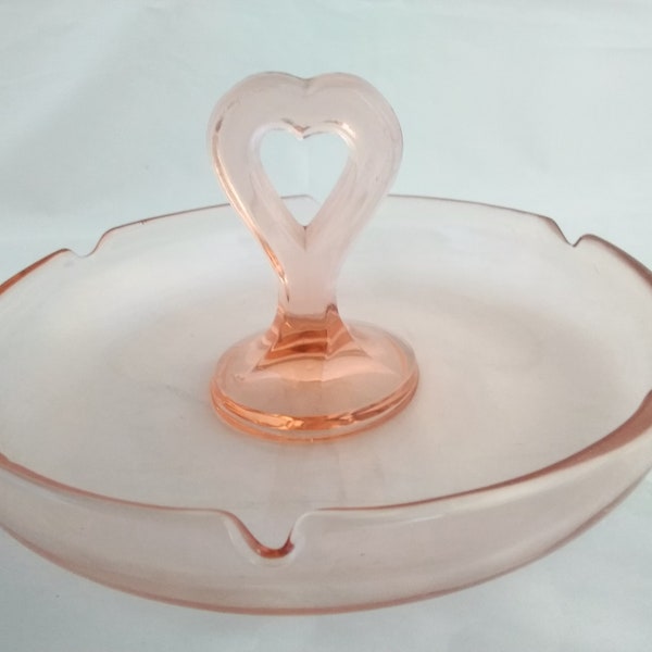 A matching set of 2 depression glass tidbit servers with a heart handle.  Bowl 476