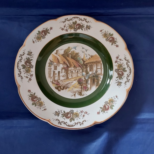 An Ascot Service Plate, 10.5" decorative wall plate with great details of a town scene. It is by Wood and Sons from the 1970s.  Plate 749