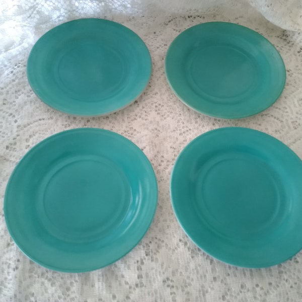 A set of 4 matching Sierra Ovide Aqua colored Hazel Atlas 7" salad or dessert plates in their Moderntone Platonite design.  DWS 436