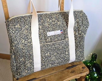Green floral print quilted baby changing bag