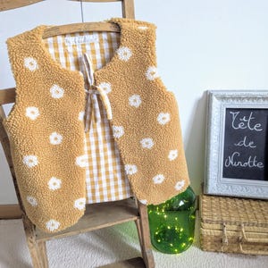 Adult size sleeveless sherpa and gingham shepherd's vest