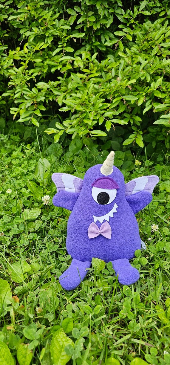 Purple plush toy sale