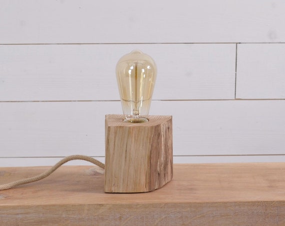 Wood table lamp made with a split wood log