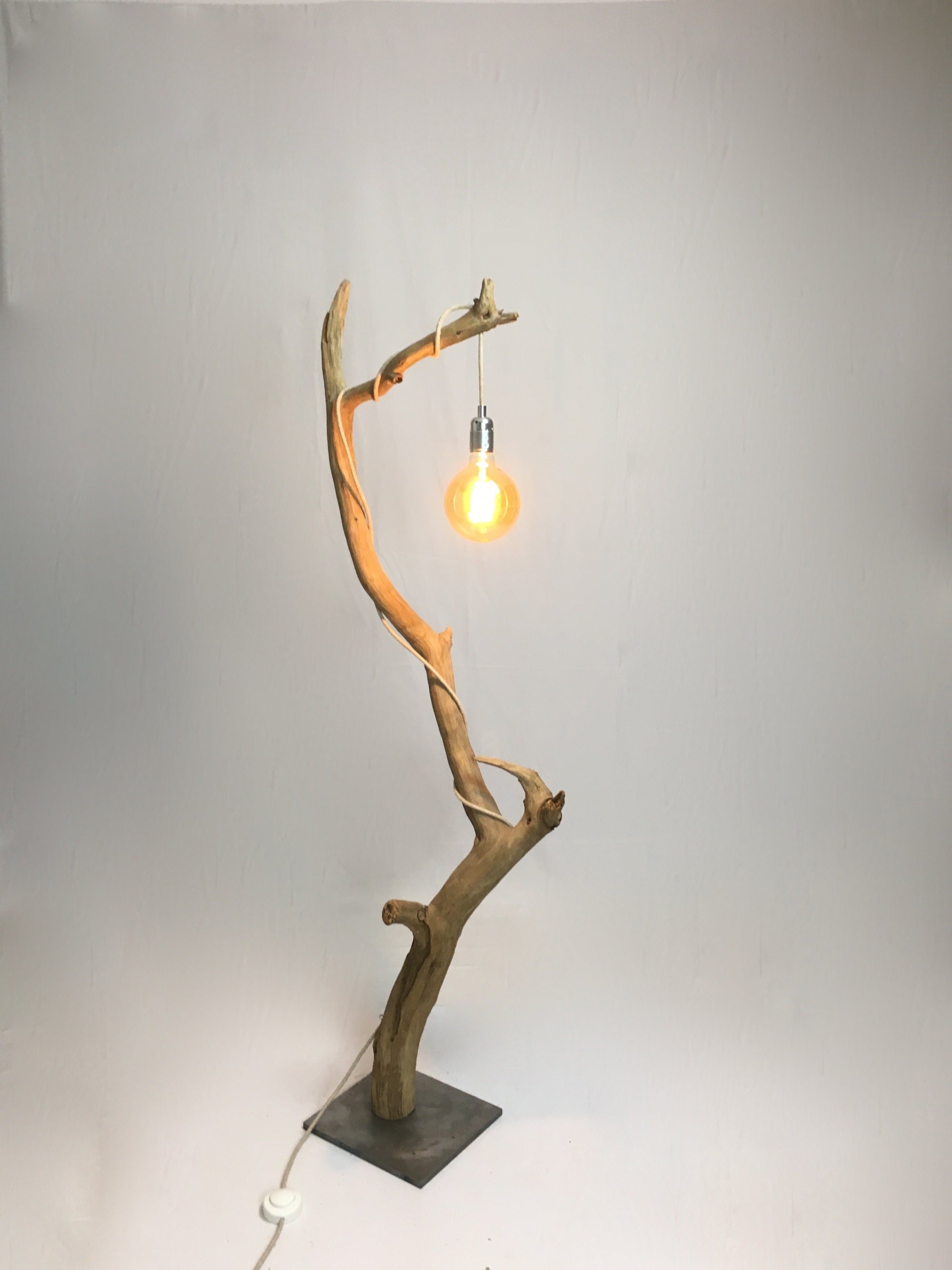 Driftwood floor lamp with cloth cable, steel base and vintage bulb