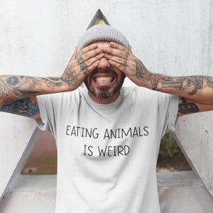 Eating Animals Is Weird Vegan Shirt - Unisex Avocado Tee