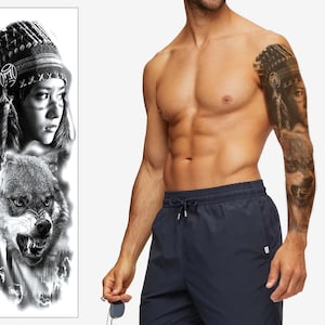 Puede incluir: Tatuaje temporal en blanco y negro con una mujer nativa americana con un tocado y un lobo. El tatuaje se aplica en la parte superior del brazo de una persona.