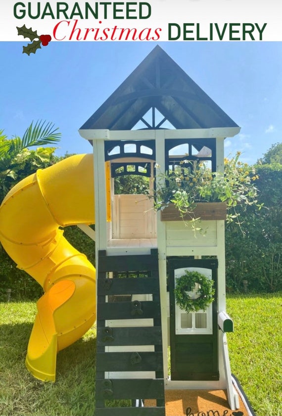 outside playhouse with slide