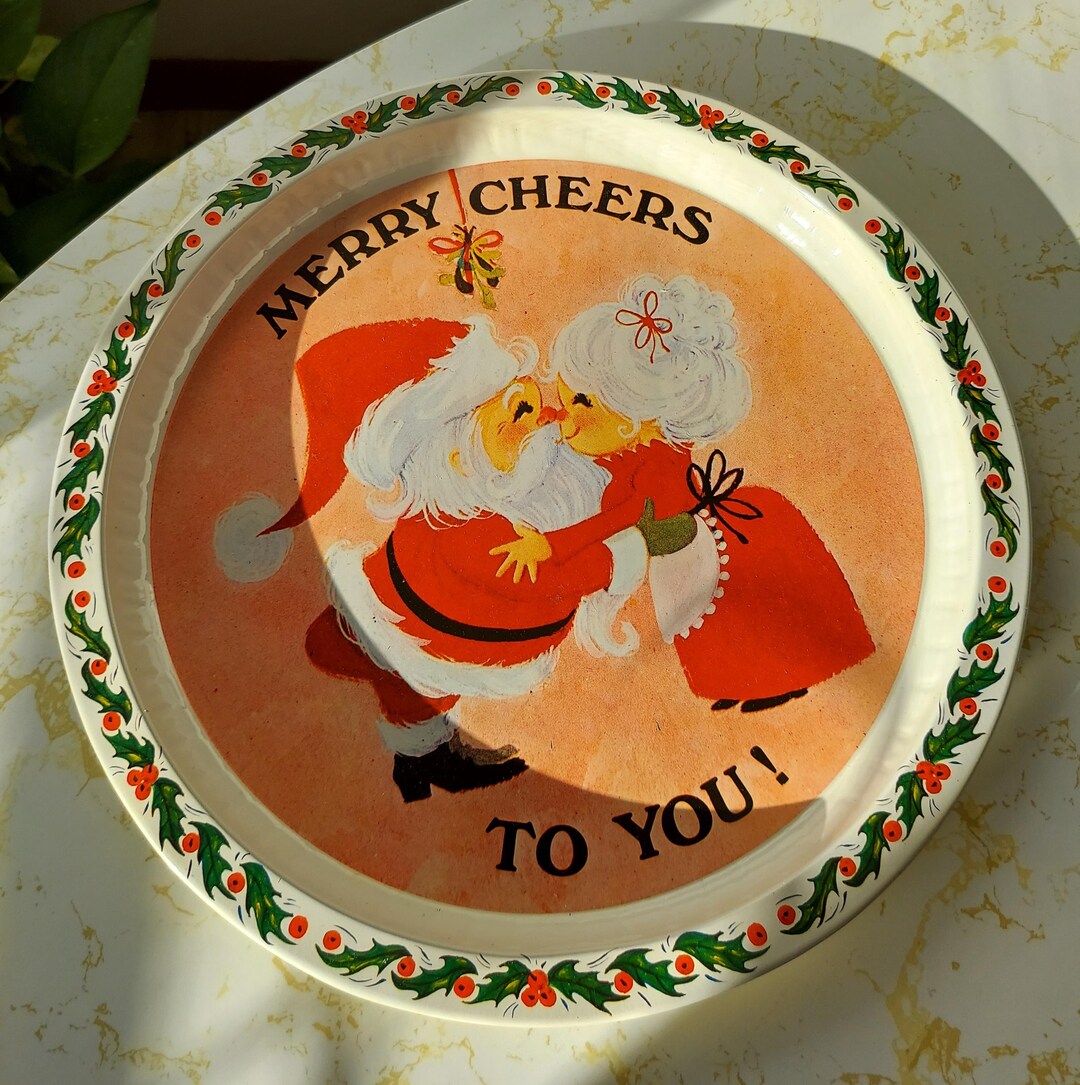 Vintage Decorative Metal Santa and Mrs Claus Kissing Round Metal ...