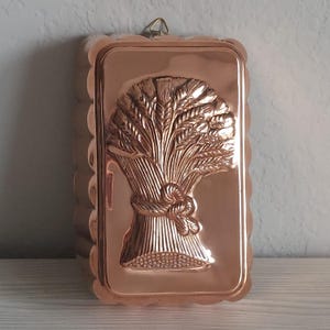 Molde de cobre antiguo para gavillas de trigo, decoración de cocina de estilo campestre francés.