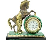 Mantel clock (Fireplace clock) of stone Malachite and Dolerite with bronze figurine Horse
