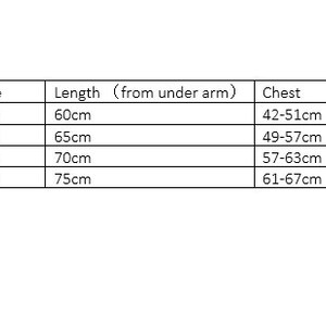 May include: A black and white sizing chart table with columns for Size, Age, Length from under arm, Chest, and Heights. The rows list sizes S, M, L, and XL with corresponding measurements in cm for ages 1-8 and heights from 80cm to 140cm.