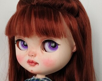 Icy doll, fringed burgundy hair. Asian features. Cute girl