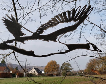 This barnacle goose in corten metal takes flight from your garden.