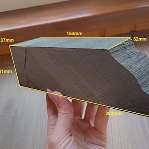The edge of a 2840 year old bog oak tree. 370g/13.05oz