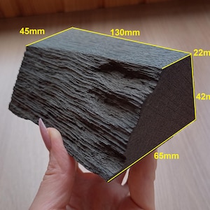 The edge of bog oak. 2840 years. 194g/6.84oz