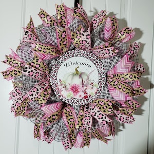 Glitzy Fall Wreath with Welcome Pumpkin Sign and Leopard Print Ribbon.