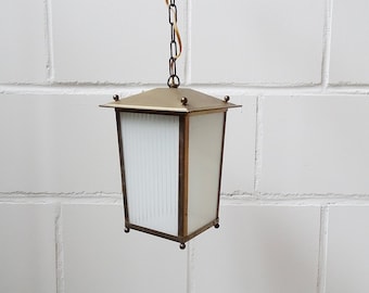 Pendant lamp made of brass and glass in lantern shape