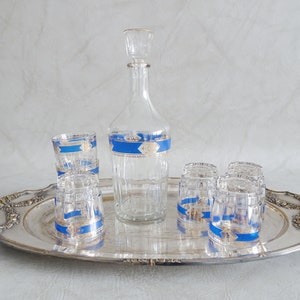 Italian glass carafe with glasses and silver plate