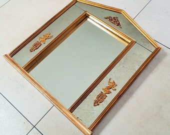 French Empire mirror with gilded wooden frame