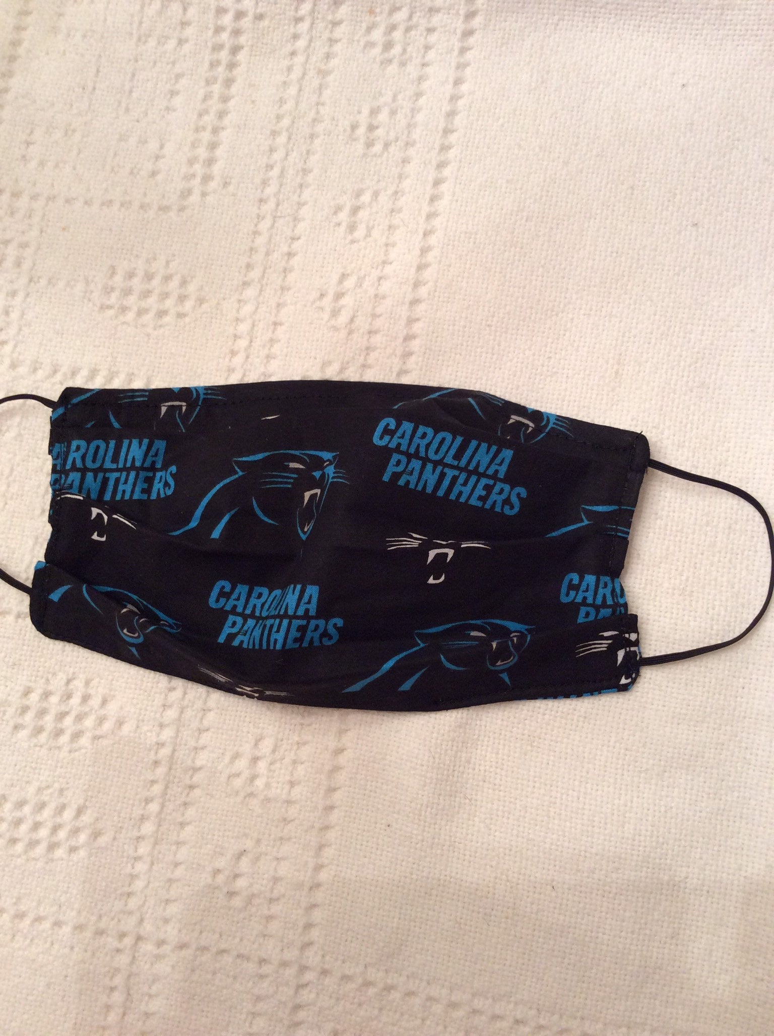 Adult Carolina Panthers Non Medical Face Mask.