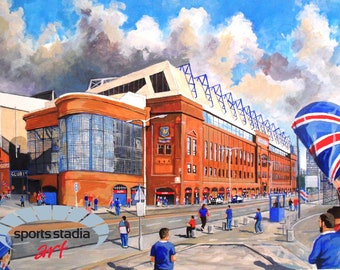 May include: A painting of a large red brick stadium with a blue and white roof structure under a cloudy sky. People walk on the street in front of the building, and a person holds a blue, white, and red flag. The text sports stadia art is visible.