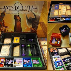 May include: A board game box with a black and brown insert for organizing game pieces. The box lid features a colorful illustration of a clock tower and a winged creature. The game is called "Pendulum".