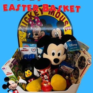 May include: A white basket filled with Mickey Mouse themed Easter basket items, including a plush Mickey Mouse toy, a Mickey Mouse mug, a Mickey Mouse puzzle, and other toys. The basket is decorated with a Mickey Mouse and Minnie Mouse sign.