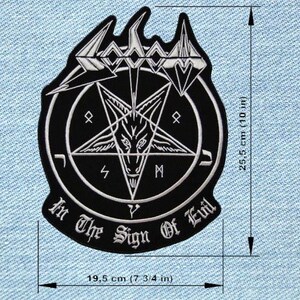 May include: Black and white embroidered patch featuring a pentagram with a goat's head, surrounded by a circle and the text "In The Sign Of Evil". The patch is 7 3/4 inches wide and 10 inches tall.