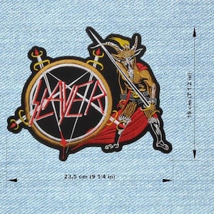 May include: Embroidered patch featuring the word "SLAYER" in red and white, surrounded by a black pentagram and gold trim. A horned figure with a sword is depicted. The patch measures 9 1/4 inches wide and 7 1/2 inches tall.