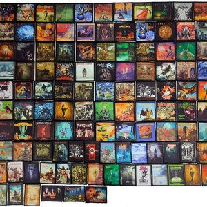 May include: A collection of 72 framed album covers featuring various metal bands. The covers are arranged in a grid pattern and feature a variety of colours, designs, and band names.