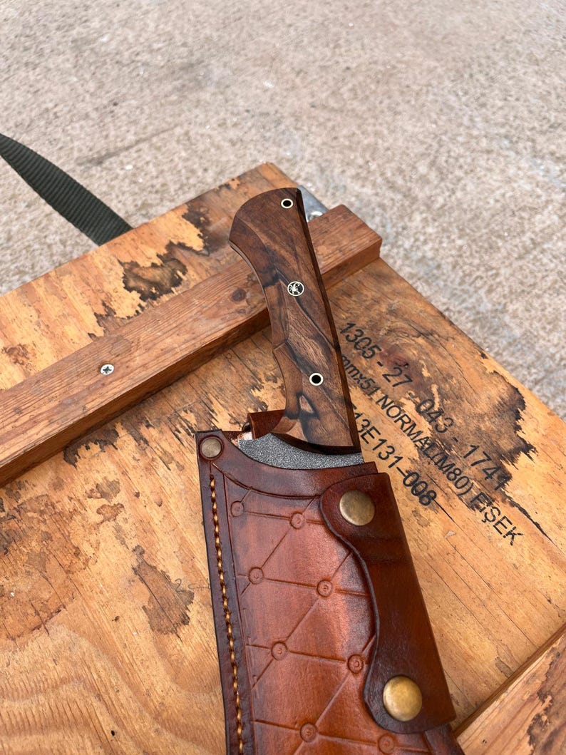 rugged sleipner tool steel blade in machete form highlighting wide chopper geometry