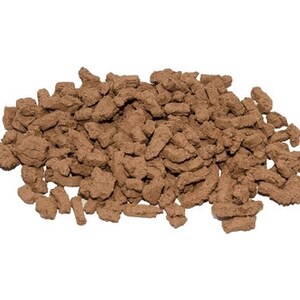 May include: A close-up of a pile of brown, irregularly shaped, crunchy dog treats.