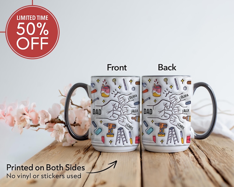 May include: White ceramic mug with a black handle and rim, featuring a design with tools, fists, and the word "DAD". The mug has the names "Olivia", "Alex", and "Chris". The text "Printed on Both Sides" is also visible.